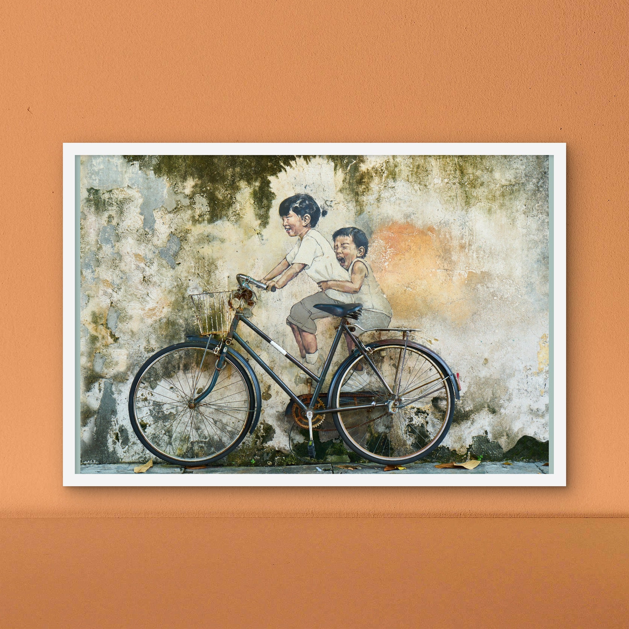 Siblings riding Bicycle