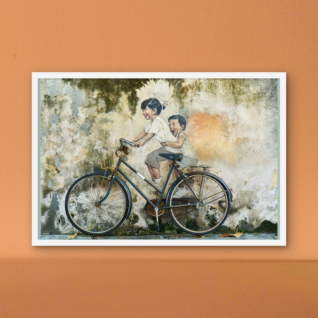 Siblings riding Bicycle